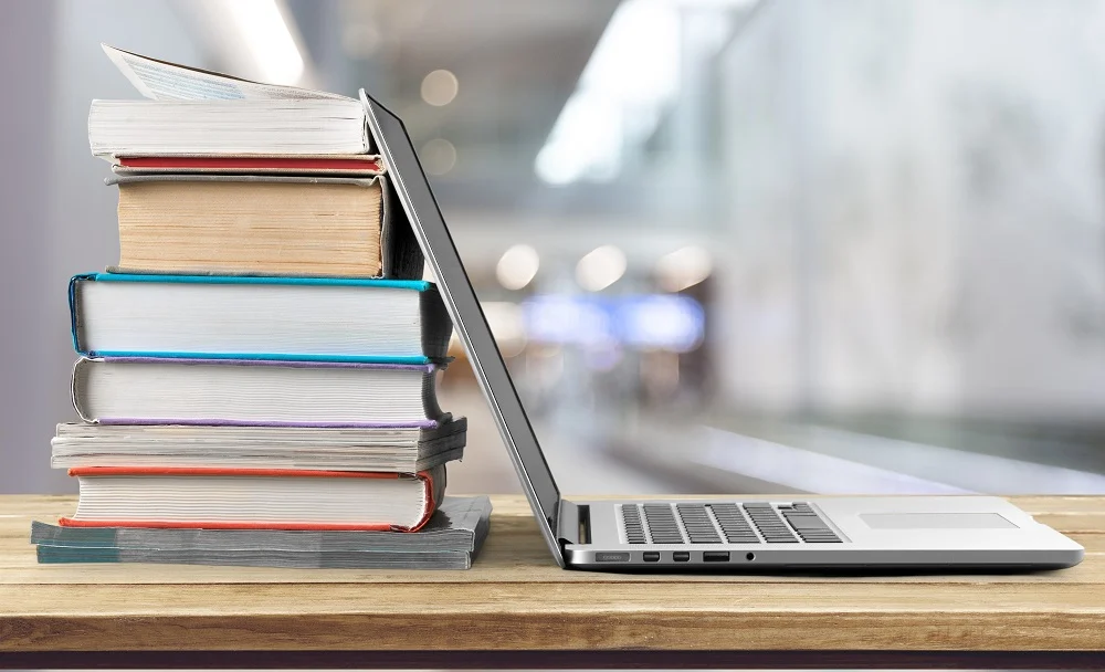 Books stacked with real data and analytics
